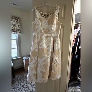 Elegant Cream and Gold Dress with Embellished Neckline